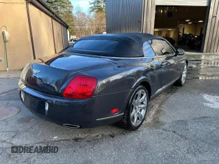 2010 Bentley Continental GT with VIN SCBDR3ZA9AC066604, listed as a Copart auction lot 43912115 with 59,156 mi miles and Clean Title. Bid and sale history available at DreamBid. Image 4.