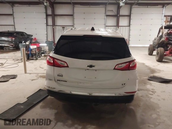 2019 Chevrolet Equinox LT with VIN 3GNAXKEV4KS538185, listed as a IAAI auction lot 41377608 with 95,691 mi miles and . Bid and sale history available at DreamBid. Image 17.