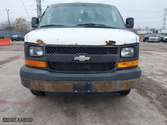 2011 Chevrolet Express Cargo Van with VIN 1GCWGFFA7B1108976, listed as a IAAI auction lot 40937070 with 296,821 mi miles. Bid and sale history available at carsss.com. Image 12.