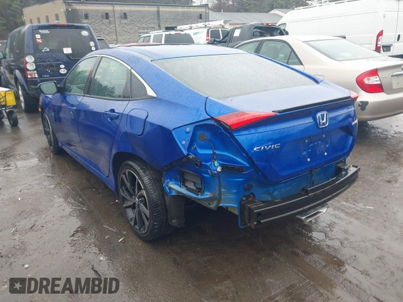 2019 Honda Civic Sport with VIN 2HGFC2F80KH602942, listed as a IAAI auction lot 41785234 with 82,661 mi miles and . Bid and sale history available at DreamBid. Image 3.