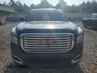 2020 GMC Yukon SLT with VIN 1GKS1BKC5LR105369, listed as a Copart auction lot 71971614 with 52,999 mi miles and Salvage Title. Bid and sale history available at DreamBid. Image 5.