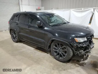 2014 Jeep Grand Cherokee Overland with VIN 1C4RJFCG8EC320849, listed as a Copart auction lot 49447355 with 183,726 mi miles and Salvage Title. Bid and sale history available at carsss.com. Image 4.