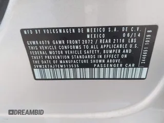2014 Volkswagen Jetta S with VIN 3VW2K7AJ7EM313535, listed as a IAAI auction lot 41786112 with 63,694 mi miles and . Bid and sale history available at DreamBid. Image 9.