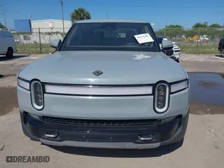 2022 Rivian R1T Adventure Package with VIN 7FCTGAAA2NN006053, listed as a IAAI auction lot 41974199 with 286 mi miles. Bid and sale history available at carsss.com. Image 6.
