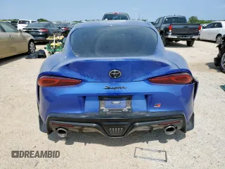 2023 Toyota Supra 3.0 with VIN WZ1DB0G05PW054758, listed as a Copart auction lot 60202015 with 32,974 mi miles and Salvage title. Bid and sale history available at DreamBid. Image 6.