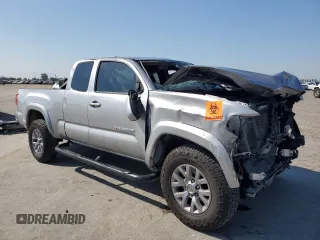 2016 Toyota Tacoma SR z VIN 5TFRX5GN2GX052555, wystawiony jako Copart lot #55353025 z przebiegiem 134 974 mil mil oraz Szkoda całkowita • Salvage title. Historia ofert i sprzedaży dostępna na DreamBid. Obrazek 4.