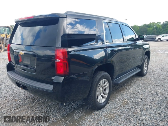 2015 Chevrolet Tahoe LS с VIN 1GNSCAKC5FR101933, выставлен на аукционе IAAI как лот 42242415 с пробегом 185 191 миль миль и . История ставок и продаж доступна на DreamBid. Изображение 4.