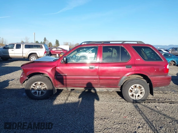 2002 Isuzu Rodeo with VIN 4S2DM58W624335632, listed as a IAAI auction lot 41690735 with 186,480 mi miles and . Bid and sale history available at DreamBid. Image 15.