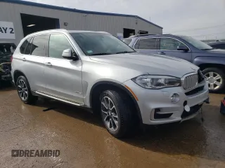 2014 BMW X5 xDrive35i with VIN 5UXKR0C5XE0K48574, listed as a Copart auction lot 46288555 with 96,303 mi miles and Salvage Title. Bid and sale history available at carsss.com. Image 4.