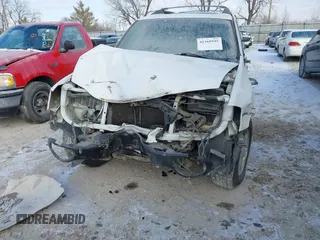 2004 GMC Envoy XL SLE with VIN 1GKET16S046229037, listed as a IAAI auction lot 41369595 with 178,729 mi miles. Bid and sale history available at carsss.com. Image 6.