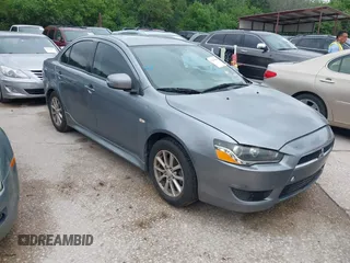 2016 Mitsubishi Lancer ES with VIN JA32U2FU4GU008977, listed as a IAAI auction lot 42139304 with 145,521 mi miles. Bid and sale history available at carsss.com. Image 1.