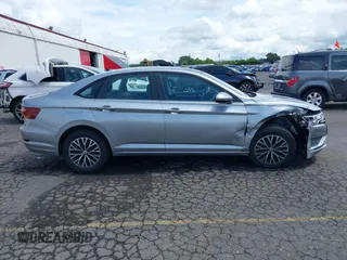 2019 Volkswagen Jetta S with VIN 3VWC57BU2KM215738, listed as a IAAI auction lot 42131376 with 52,720 mi miles and . Bid and sale history available at DreamBid. Image 13.
