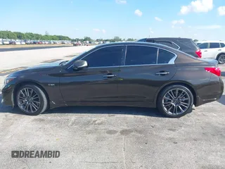 2016 Infiniti Q50 Red Sport 400 with VIN JN1FV7AR4GM451987, listed as a IAAI auction lot 41891826 with 64,931 mi miles and . Bid and sale history available at DreamBid. Image 14.