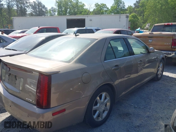2007 Cadillac STS z VIN 1G6DW677X70117510, wystawiony jako IAAI lot #42061512 z przebiegiem 187 798 mil mil oraz . Historia ofert i sprzedaży dostępna na DreamBid. Obrazek 4.