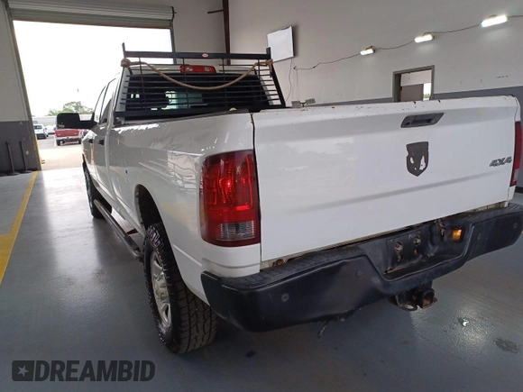 2017 Ram 2500 Tradesman z VIN 3C6TR5HT0HG771975, wystawiony jako IAAI lot #42801757 z przebiegiem 185 058 mil mil oraz . Historia ofert i sprzedaży dostępna na DreamBid. Obrazek 16.