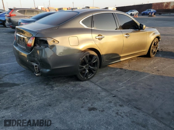 2011 Infiniti M37 with VIN JN1BY1AP7BM320322, listed as a Copart auction lot 83215494 with 116,957 mi miles and Salvage Title. Bid and sale history available at carsss.com. Image 3.