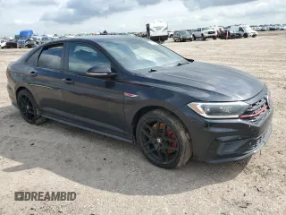 2020 Volkswagen Jetta GLI S z VIN 3VW6T7BU9LM023902, wystawiony jako Copart lot #54798935 z przebiegiem 91 722 mil mil oraz Szkody całkowita. Historia ofert i sprzedaży dostępna na DreamBid. Obrazek 4.