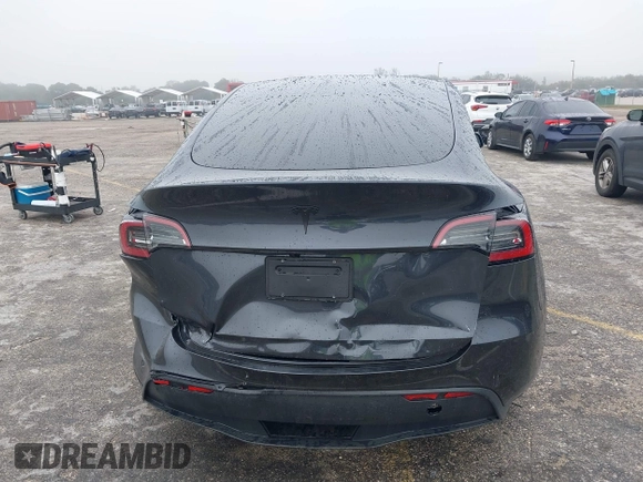 2024 Tesla Model Y with VIN 7SAYGDED8RF213927, listed as a IAAI auction lot 41386687 with 3,599 mi miles and . Bid and sale history available at DreamBid. Image 16.
