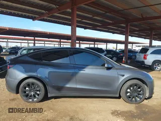 2022 Tesla Model Y Long Range with VIN 7SAYGDEE2NA017434, listed as a IAAI auction lot 41842025 with 35,164 mi miles and . Bid and sale history available at DreamBid. Image 13.