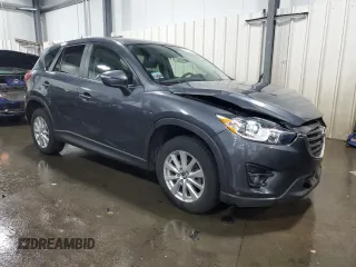 2016 Mazda CX-5 Touring z VIN JM3KE4CY5G0852073, wystawiony jako Copart lot #56599055 z przebiegiem 72 167 mil mil oraz Szkoda całkowita • Salvage title. Historia ofert i sprzedaży dostępna na DreamBid. Obrazek 4.