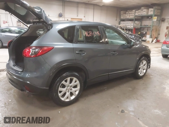 2013 Mazda CX-5 Touring with VIN JM3KE4CE4D0157892, listed as a IAAI auction lot 41684348 with 146,496 mi miles and . Bid and sale history available at DreamBid. Image 4.