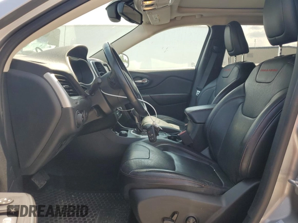 2016 Jeep Cherokee Trailhawk with VIN 1C4PJMBS4GW353088, listed as a Copart auction lot 62275145 with 129,758 mi miles and Clean title. Bid and sale history available at DreamBid. Image 7.