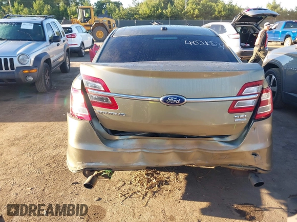 2013 Ford Taurus SEL with VIN 1FAHP2E91DG235771, listed as a IAAI auction lot 40210537 with 179,780 mi miles and . Bid and sale history available at carsss.com. Image 6.