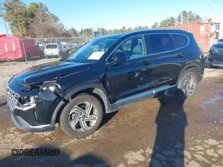 2022 Hyundai Santa Fe SEL with VIN 5NMS24AJXNH375497, listed as a IAAI auction lot 41390349 with 77,067 mi miles and . Bid and sale history available at DreamBid. Image 2.