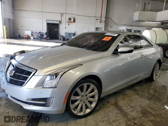 2015 Cadillac ATS Luxury AWD z VIN 1G6AH1RX4F0113934, wystawiony jako Copart lot #84439094 z przebiegiem 56 679 mil mil oraz Szkoda całkowita • Salvage title. Historia ofert i sprzedaży dostępna na DreamBid. Obrazek 1.