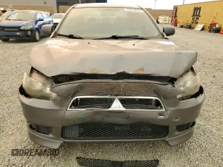 2011 Mitsubishi Lancer GTS with VIN JA32U8FW2BU005251, listed as a Copart auction lot 70879824 with 124,317 mi miles and Salvage Title. Bid and sale history available at carsss.com. Image 5.