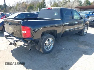 2013 Chevrolet Silverado 1500 LT with VIN 3GCPCSE01DG244414, listed as a IAAI auction lot 41770383 with 162,559 mi miles and . Bid and sale history available at DreamBid. Image 4.