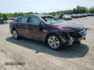 2011 Ford Taurus Limited with VIN 1FAHP2FW6BG157070, listed as a Copart auction lot 59300415 with 143,314 mi miles and Salvage title. Bid and sale history available at DreamBid. Image 14.