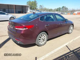 2017 Kia Optima LX with VIN 5XXGT4L33HG163285, listed as a IAAI auction lot 41802193 with 122,159 mi miles. Bid and sale history available at carsss.com. Image 4.