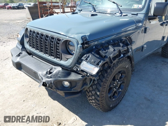 2024 Jeep Wrangler Sport S with VIN 1C4PJXDN2RW351741, listed as a IAAI auction lot 42122651 with 4,241 mi miles and . Bid and sale history available at DreamBid. Image 6.