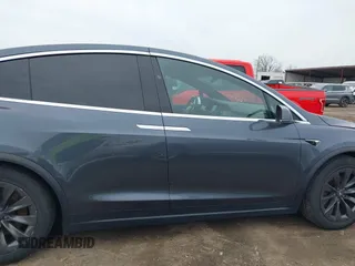 2019 Tesla Model X 75D with VIN 5YJXCDE24KF152150, listed as a IAAI auction lot 42015311 with 1 mi miles. Bid and sale history available at carsss.com. Image 13.
