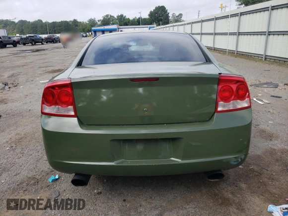 2010 Dodge Charger Police z VIN 2B3CA4CT7AH245139, wystawiony jako Copart lot #54257155 z przebiegiem 219 135 mil mil oraz Czysty tytuł • Clean title. Historia ofert i sprzedaży dostępna na DreamBid. Obrazek 6.