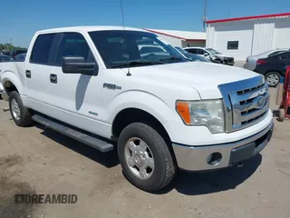 2012 Ford F-150 XL with VIN 1FTFW1ET1CKD26903, listed as a IAAI auction lot 42065999 with 212,260 mi miles and . Bid and sale history available at DreamBid. Image 1.