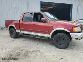 2001 Ford F-150 SuperCrew XLT with VIN 1FTRW08WX1KD75043, listed as a Copart auction lot 68133614 with 139,134 mi miles and Salvage Title. Bid and sale history available at carsss.com. Image 4.
