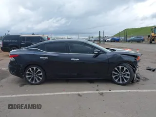 2016 Nissan Maxima SV z VIN 1N4AA6AP8GC408857, wystawiony jako IAAI lot #41892425 z przebiegiem 185 487 mil mil oraz . Historia ofert i sprzedaży dostępna na DreamBid. Obrazek 14.