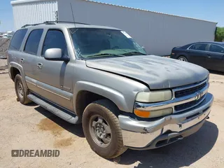 2001 Chevrolet Tahoe LT z VIN 1GNEK13T71R212636, wystawiony jako IAAI lot #42398730 z przebiegiem Nie podano mil oraz . Historia ofert i sprzedaży dostępna na DreamBid. Obrazek 1.