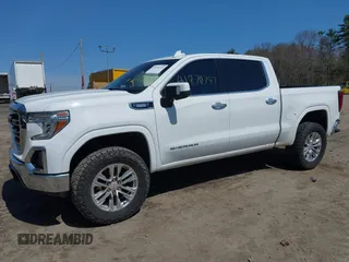 2022 GMC Sierra 1500 SLT with VIN 3GTU9DET9NG210715, listed as a IAAI auction lot 41870747 with 61,371 mi miles and . Bid and sale history available at DreamBid. Image 2.