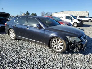 2009 Lexus LS 460 with VIN JTHCL46FX95000898, listed as a Copart auction lot 88355735 with 237,714 mi miles and Salvage title. Bid and sale history available at DreamBid. Image 4.