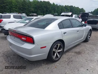 2013 Dodge Charger Police with VIN 2C3CDXAT3DH676824, listed as a IAAI auction lot 42483890 with 136,924 mi miles and . Bid and sale history available at DreamBid. Image 4.