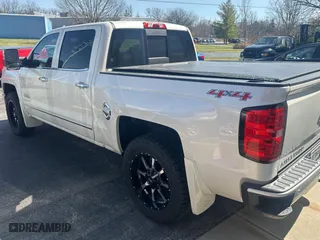 2015 Chevrolet Silverado 1500 High Country with VIN 3GCUKTEC4FG142789, listed as a Copart auction lot 51507825 with 218,796 mi miles and Clean Title. Bid and sale history available at carsss.com. Image 3.