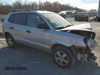 2005 Hyundai Tucson GL with VIN KM8JM12B95U067091, listed as a Copart auction lot 79297524 with 0 mi miles and Salvage Title. Bid and sale history available at carsss.com. Image 4.
