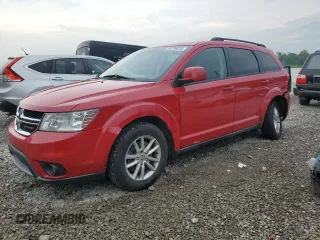 2013 Dodge Journey SXT with VIN 3C4PDCBGXDT699760, listed as a Copart auction lot 56704035 with 173,624 mi miles and Salvage title. Bid and sale history available at DreamBid. Image 1.