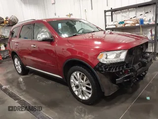 2014 Dodge Durango Citadel with VIN 1C4RDJEG4EC502605, listed as a IAAI auction lot 42152879 with 141,900 mi miles and . Bid and sale history available at DreamBid. Image 1.
