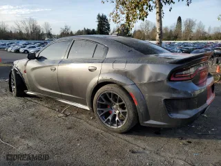 2022 Dodge Charger SRT Hellcat Widebody with VIN 2C3CDXL97NH155124, listed as a Copart auction lot 82694254 with 27,678 mi miles and Salvage Title. Bid and sale history available at carsss.com. Image 2.