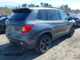 2021 Honda Passport Elite with VIN 5FNYF8H08MB011467, listed as a IAAI auction lot 41929708 with 34,106 mi miles. Bid and sale history available at carsss.com. Image 4.
