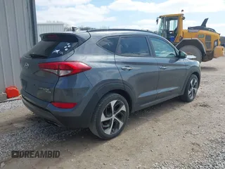 2016 Hyundai Tucson Eco with VIN KM8J3CA2XGU103017, listed as a IAAI auction lot 41897807 with 95,722 mi miles. Bid and sale history available at carsss.com. Image 4.